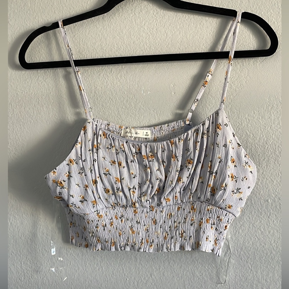 Purple tank top. NEVER WORN